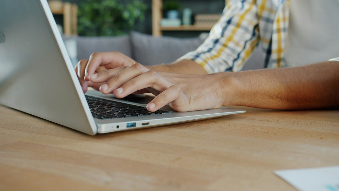 person reviewing insurance policy on computer