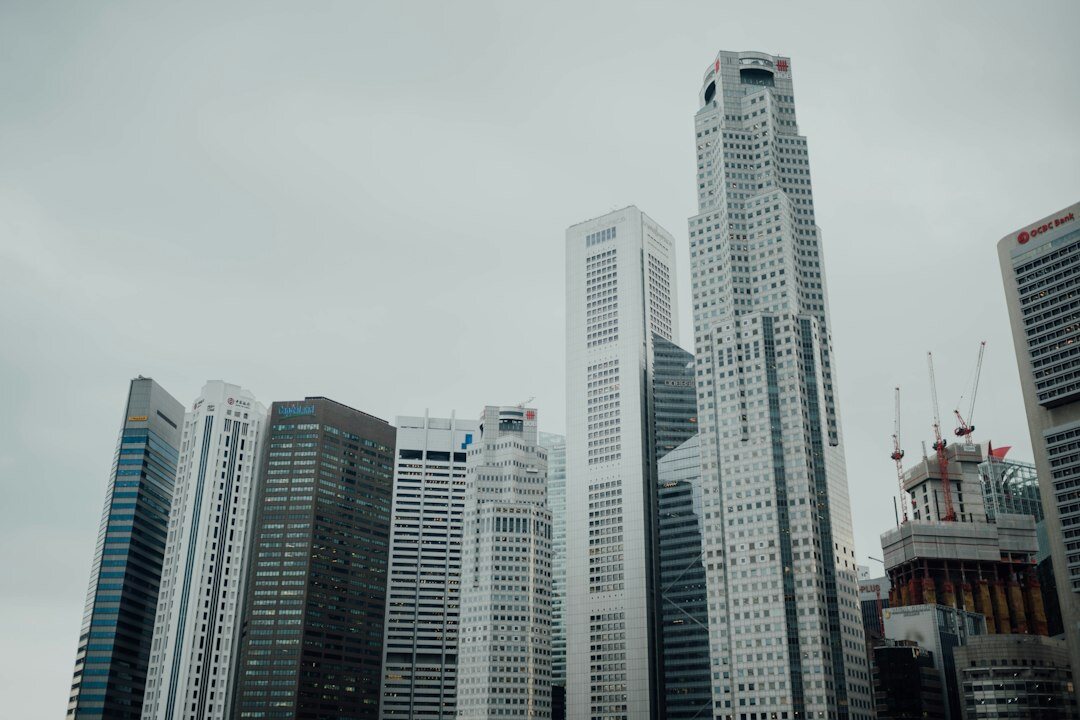 Modern glass office building exterior in Singapore's business district